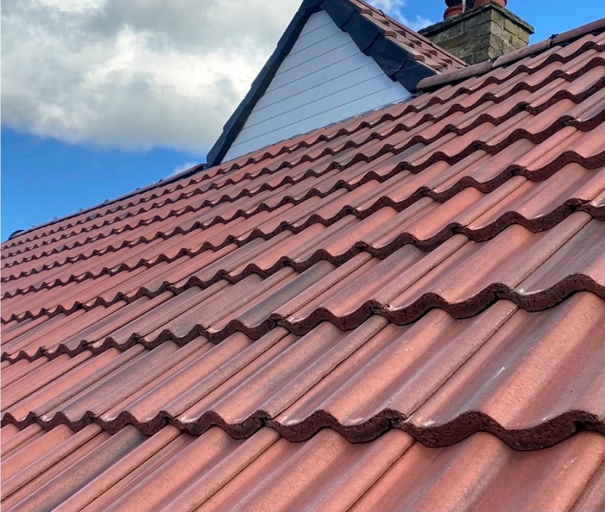 Traditional red clay pantile roof close-up